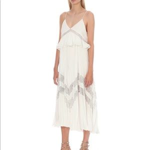 White dress lace, no signs of wear, Like new with no tags, only worn twice.